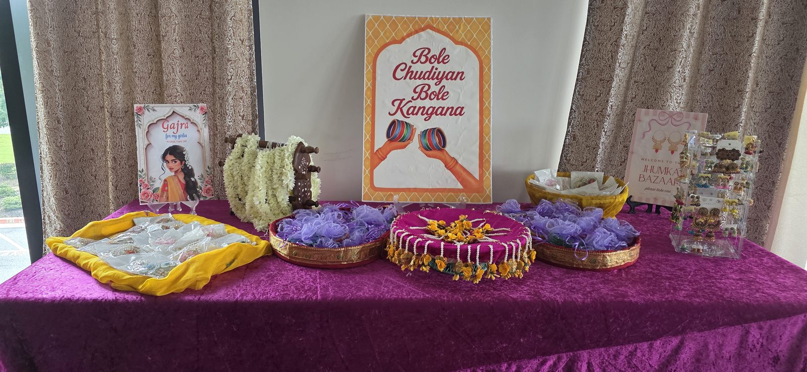 Mehndi favor table with bangles and gajra