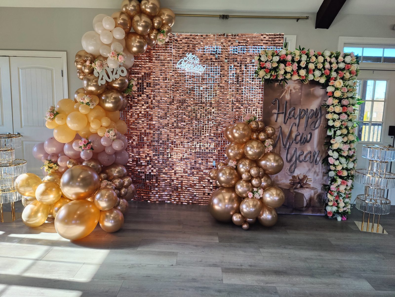 New Year's Eve celebration backdrop with gold balloons