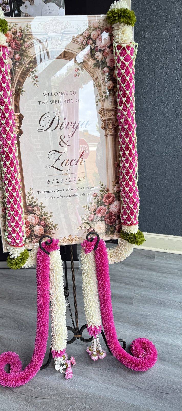 Floral wedding welcome sign with jaimala garlands